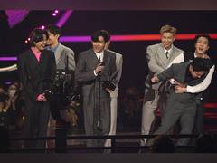
      
      BTS wins AMAs 'Artist of The Year' for the first time as an...
      
      