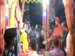 
      
      People celebrate Ganesh Utsav in Delhi's Karol Bagh
      
      