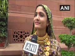 
      
      Gujarati folk singer Geeta Rabari meets PM Modi
      
      