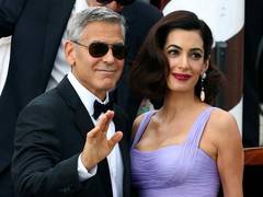 
      
      Amal Clooney gushes over husband George Clooney during book...
      
      
