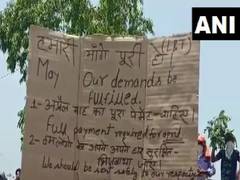 
      
      Migrant labourers in Vizag protest demanding payment of...
      
      