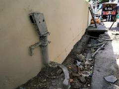 
      
      Half buried in a wall lies Lucknow's 'Anarkali' handpump!
      
      