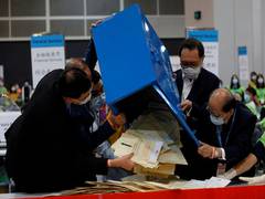 
      
      Polls close in first elections post electoral system changes...
      
      