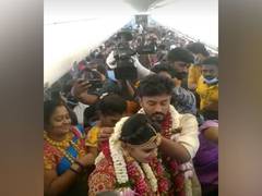 
      
      Tamil Nadu couple gets hitched on rented flight, big fat...
      
      