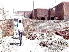 
      
      Century-old Christian graveyard, homes in Pakistan's Punjab...
      
      