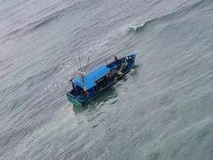 
      
      Naval helicopter rescues fishermen from damaged fishing boat...
      
      