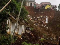 
      
      At least 5 people killed, 70 missing as landslides hit gold...
      
      