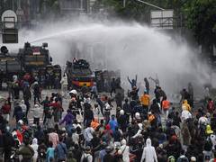 
      
      Indonesian Police, demonstrators clash on third day of...
      
      