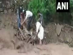 
      
      Houses damaged, vehicles washed away in flash floods in J-K's...
      
      