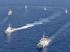 
      
      Chinese ships surround disputed island, Philippines files...
      
      