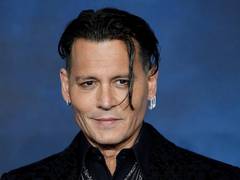 
      
      First look of Johnny Depp as war photographer at Cannes is out
      
      
