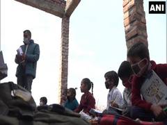 
      
      Students forced to study in open as school building...
      
      