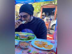 
      
      Kartik Aaryan wonders 'how much he eats' after seeing his fan...
      
      