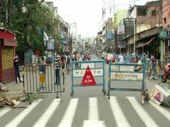 
      
      Post Amphan: Locals of Kolkata's Baghajatin area block road...
      
      