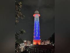 
      
      Nepal's historic masterpiece Dharahara illuminates on Yoga Day
      
      