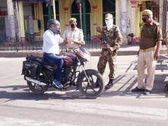 
      
      Markets deserted, circles marked for social distancing:...
      
      