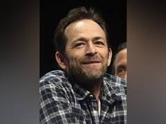 
      
      Iconic '90210' actor Luke Perry dies at 52
      
      