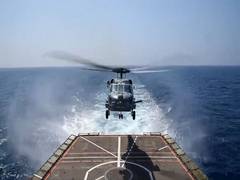 
      
      Royal Australian Navy undertakes cross deck operations with...
      
      