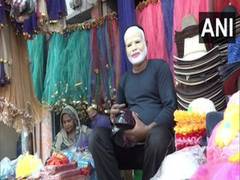 
      
      Uttar Pradesh: Holi fever grips Prayagraj, Modi masks in demand
      
      