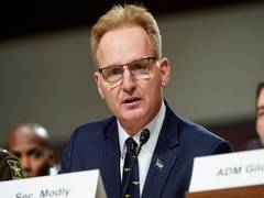 
      
      US Navy chief resigns after firing captain of...
      
      