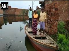 
      
      UP: With severe water-logging in Moradabad, people use boats...
      
      