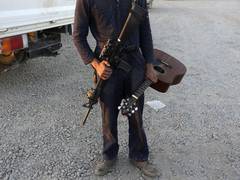 
      
      Afghan musicians urge Taliban to facilitate alternative jobs...
      
      