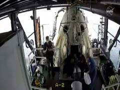 
      
      SpaceX capsule opens, NASA astronauts brought out of spacecraft
      
      