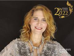 
      
      Lisa Moore earns title of 