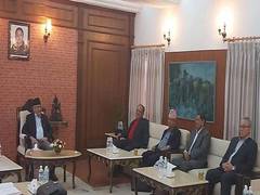 
      
      PM Oli hands over party reins to Dahal in exchange for...
      
      