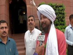 
      
      BJP's Nisith Pramanik arrives in Parliament wearing feathered...
      
      