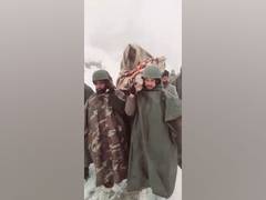 
      
      Army soldiers carry ailing woman on shoulders for 8 km to...
      
      