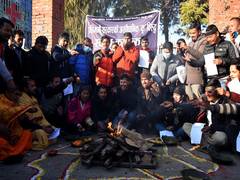
      
      Students in Nepal perform vedic practice to mock government's...
      
      