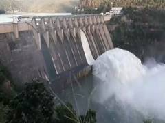
      
      One of 12 crest gates lifted as Andhra's Srisailam reservoir...
      
      