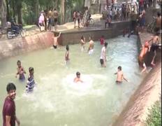 
      
      Amritsar: Residents flock to canal to get respite from...
      
      