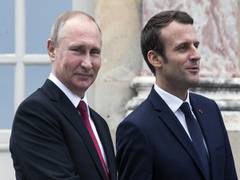 
      
      Putin, Macron exchange views on internal Ukrainian crisis: Kremlin
      
      