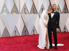 
      
      Chissy Teigen teases John Legend by wearing 'Sexiest Man...
      
      