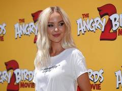 
      
      Dove Cameron shares her tattoo stories
      
      