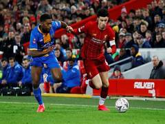 
      
      A proud moment: Curtis Jones on becoming Liverpool's youngest...
      
      