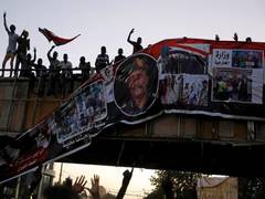 
      
      Sudan military leader vows to hand power over to people 
      
      