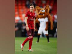
      
      'Happy' and 'healthy' Ozil eyes title
      
      