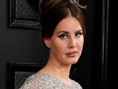 
      
      Lana Del Rey receives backlash after wearing mesh face mask...
      
      