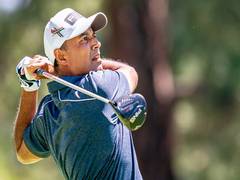 
      
      Golfer Arjun Atwal will play for Dad and Tiger Woods as he...
      
      