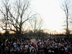 
      
      Thousands gather in London to remember slain woman
      
      