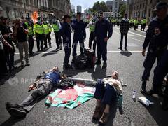 
      
      'Extinction Rebellion' climate change activists block Central...
      
      