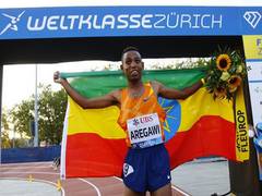 
      
      Ethiopia's Ejegayehu Taye, Berihu Aregawi break 5km world...
      
      