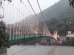 
      
      Two-wheelers banned on Ram Jhula Bridge after supportive wire...
      
      
