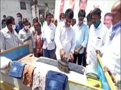 
      
      MLA B Madhusudan Reddy washes, irons clothes at washermen...
      
      
