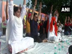 
      
      Sports Minister Rijiju, Defence Secretary Mitra attend yoga events
      
      