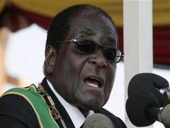 
      
      Zimbabwean soldiers take over state broadcaster headquarters...
      
      