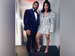
      
      Russell Wilson pampers wife Ciara as they wait for their...
      
      